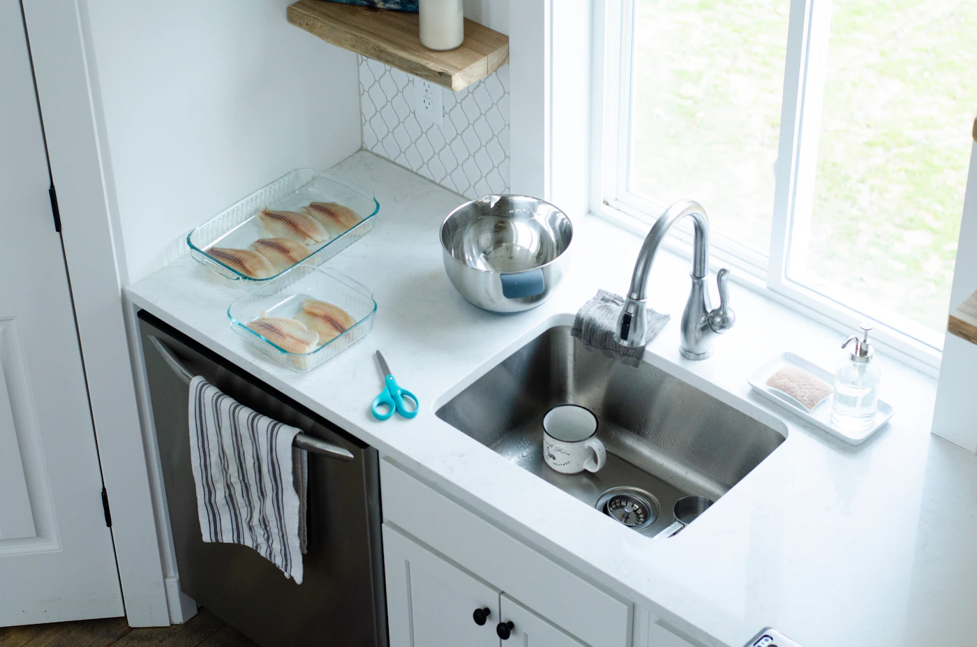 Kitchen sink and plumbing area for a London plumbing repair