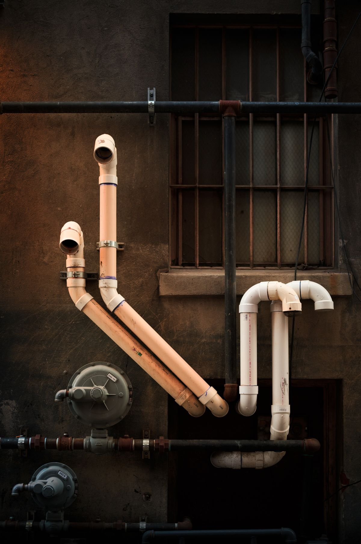Plumber in Southwark repairing pipework