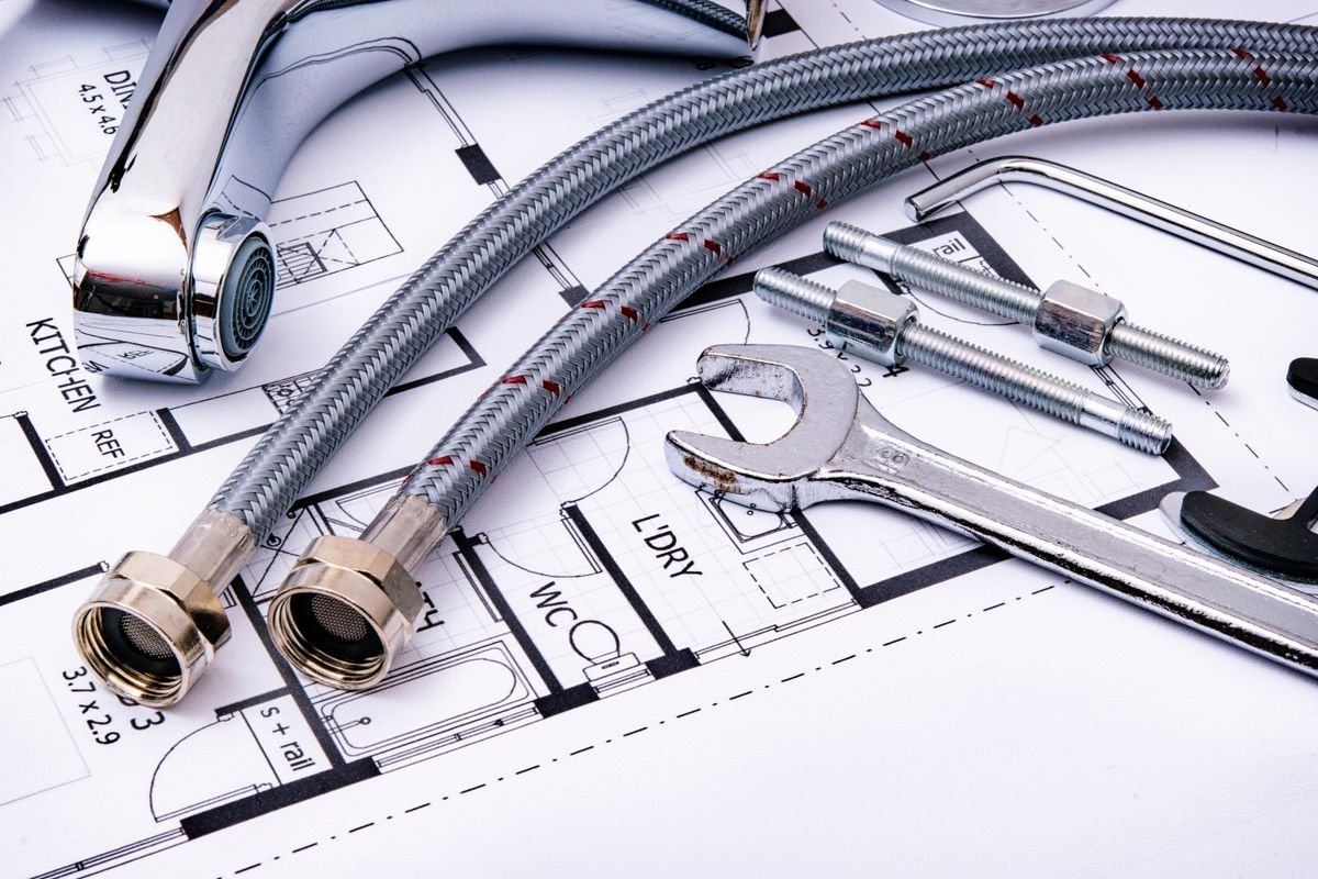 Plumber in Camden repairing pipework