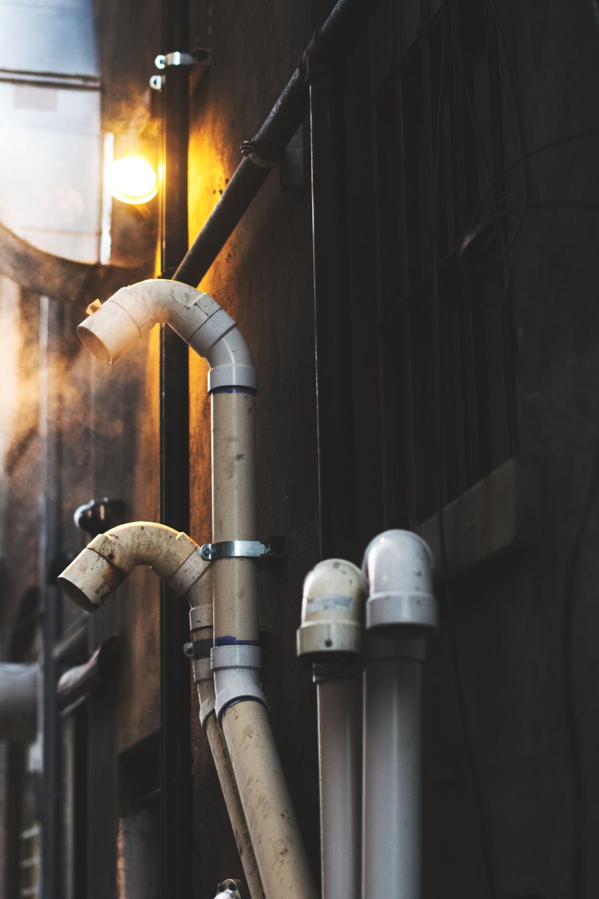 Plumber in Lewisham repairing pipework