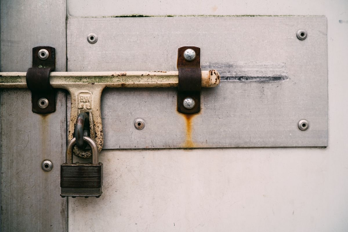 Locksmith in Camden fitting a door lock