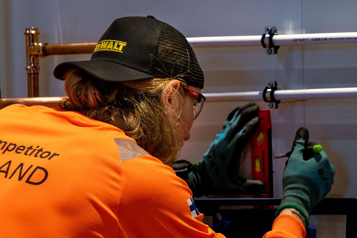 Plumber in Brent repairing pipework