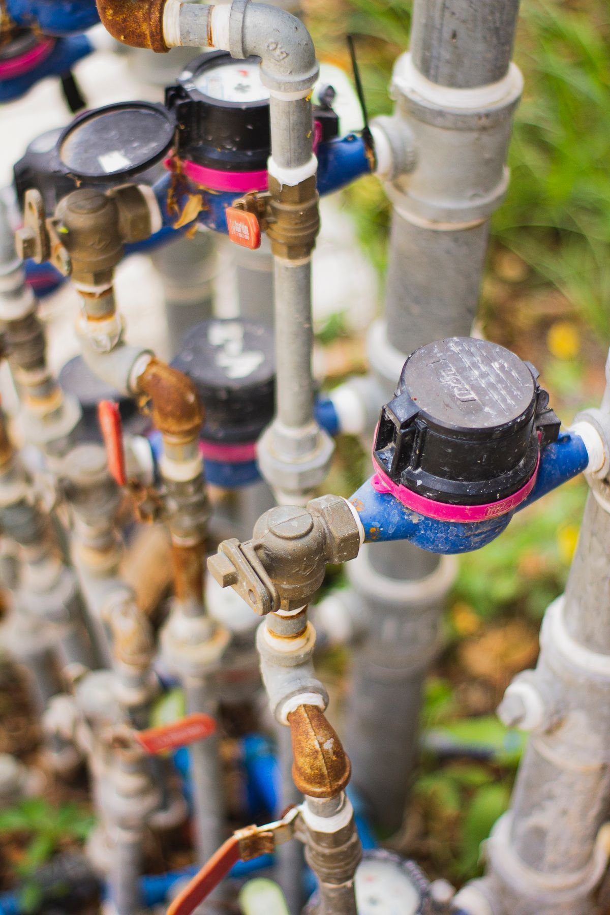 Plumber in Woking repairing pipework