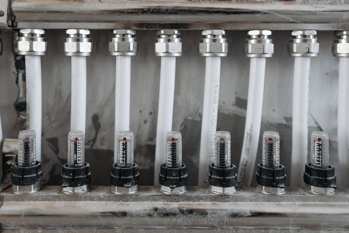 Plumber in Epsom repairing pipework