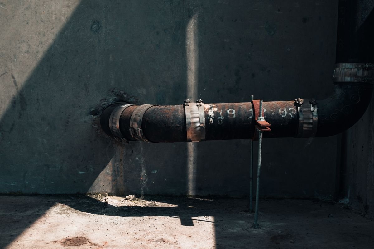 Plumber in Islington repairing pipework